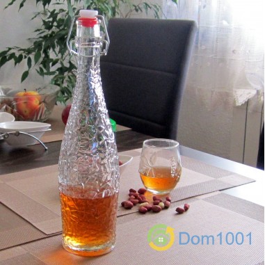 Стъклена бутилка релефно стъкло с тапа - 700 мл.